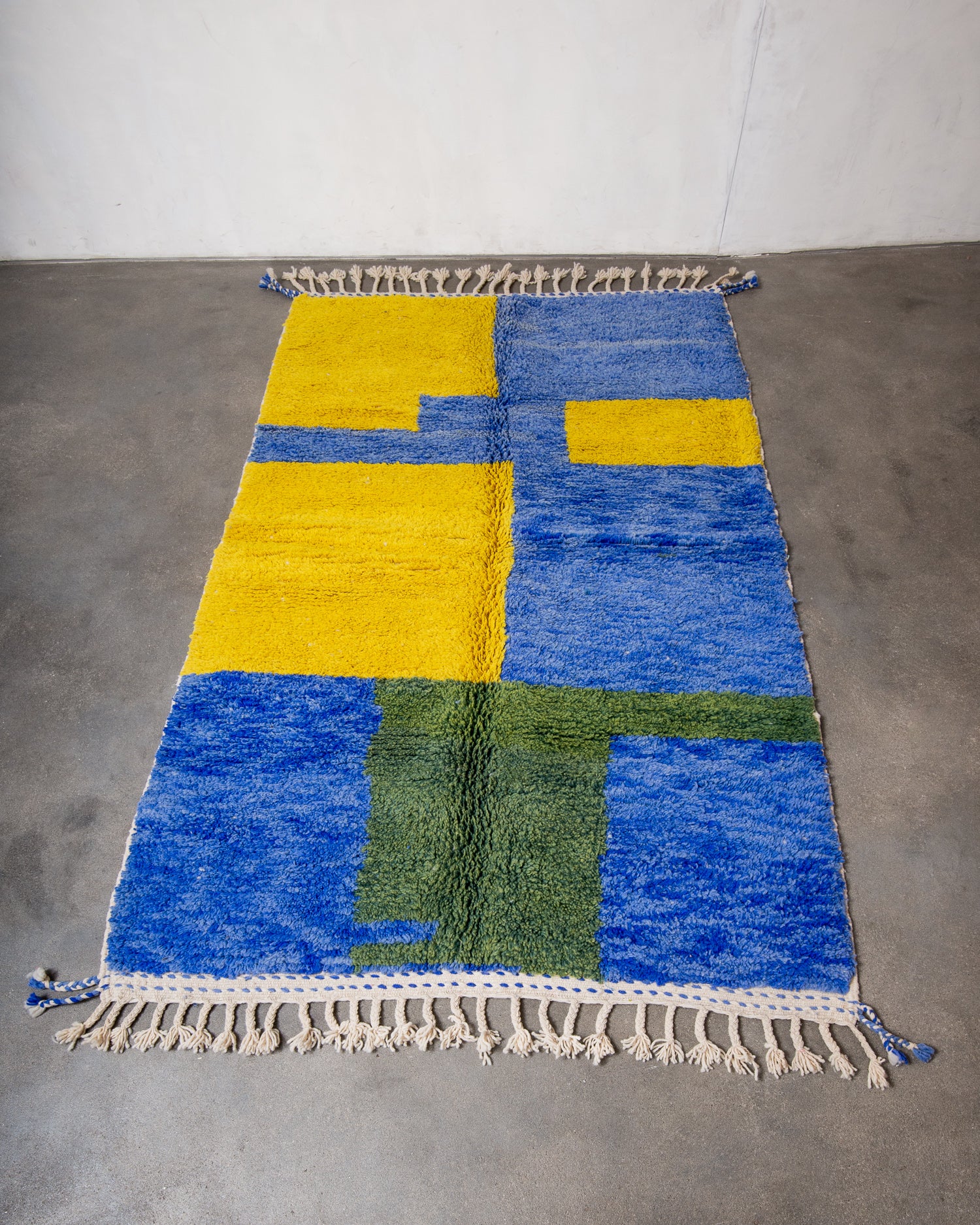 Modern, designer, handcrafted Berber rug from Morocco. Beniourain carpet with beautiful colours and patterns and fluffy wool texture.